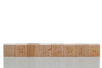 Wooden cubes with letters children on a white background