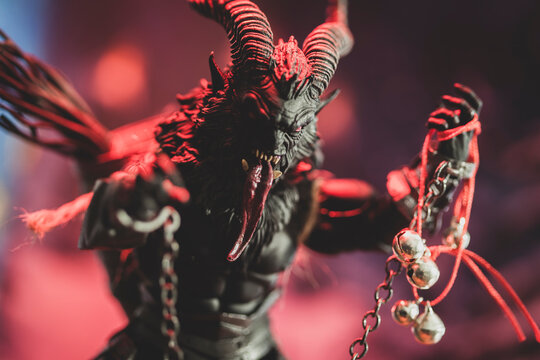 NEWE YORK USA, DEC 16 2021: ominous image of Krampus coming for misbehaving children at Christmas - Mythic Legion action figure 