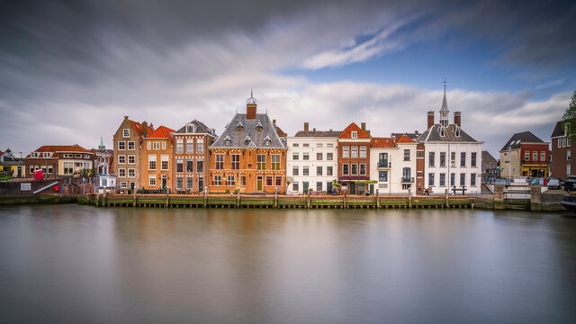 Europe, The Netherlands, Maassluis. Row of buildings on ocean pier.
