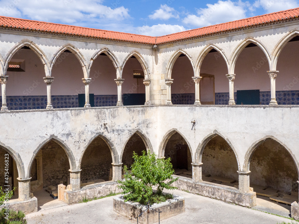 Poster Portugal, Tomar. Two levels of the cloisters of the Convent of the Order of Christ (Convento do Cristo) near the town of Tomar.