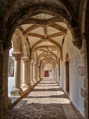 Fototapeta na wymiar Portugal, Tomar. Vaulted arch cloisters within the Convent of Christ, associated with the Knights Templar.