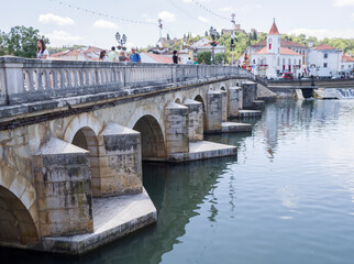 Portugal, Tomar. Bridge King D. Manuel I in the City of Tomar, called The Old Bridge by locals, crossing over the Nabao River.