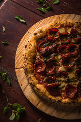 Delicious Pizza Classic Homemade Tomato Sauce Sausage Cheese Onion Chicken Meat Pasta Shrimp Restaurant Menu Gourmet on a wooden table Dark Background