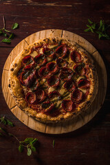 Delicious Pizza Classic Homemade Tomato Sauce Sausage Cheese Onion Chicken Meat Pasta Shrimp Restaurant Menu Gourmet on a wooden table with dark background