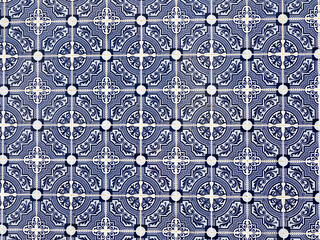 Portugal, Aveiro. Colorful azulejo tiles on the exterior wall of house.