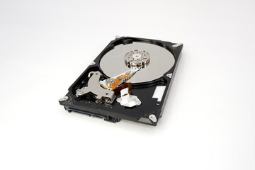 Hard drive HDD isolated on white background. The concept of data recovery, hard disk repair.