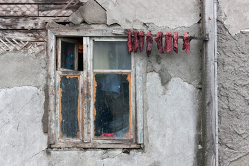 Drying walrus meat by the window, Uelen village, the most northeastern village in Russia, Russian Far East