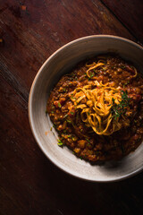 Delicious Pizza Classic Homemade Tomato Sauce Sausage Cheese Onion Chicken Meat Pasta Shrimp Restaurant Menu Gourmet on a wooden table Dark Background