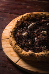 Delicious Pizza Classic Homemade Tomato Sauce Sausage Cheese Onion Chicken Meat Pasta Shrimp Restaurant Menu Gourmet on a wooden table Dark Background