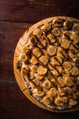 Delicious Pizza Classic Homemade Tomato Sauce Sausage Cheese Onion Chicken Meat Pasta Shrimp Restaurant Menu Gourmet on a wooden table Dark Background