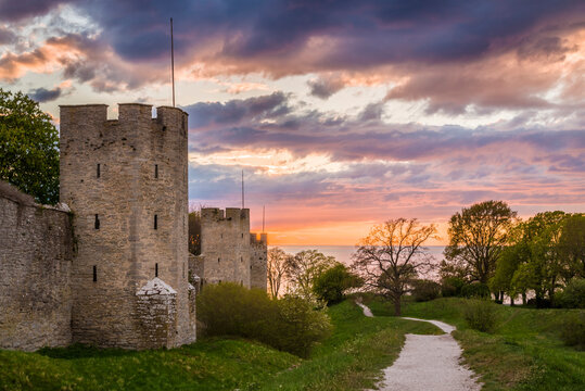 Sweden, Gotland Island, Visby, 12th century city wall, most complete medieval city wall in Europe, sunset