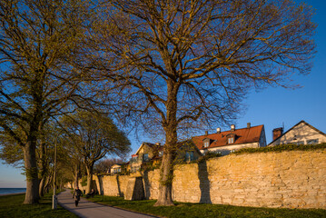 Fototapeta na wymiar Sweden, Gotland Island, Visby, 12th century city wall, most complete medieval city wall in Europe, sunset