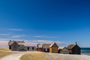 Sweden, Faro Island, Kursviken, coastal farmers fishing shacks