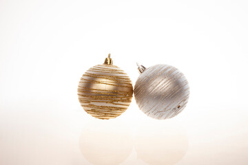 Christmas spheres on brightly colored backgrounds.