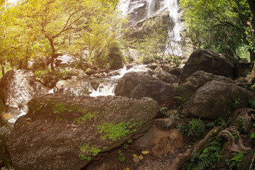 Khlong Lan Waterfall is a beautiful and famous waterfall. in National parks and in the rainforests of Thailand..