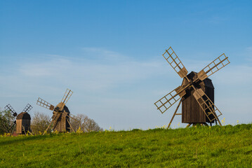 Fototapeta na wymiar Sweden, Oland Island, Lerkaka, antique wooden windmills