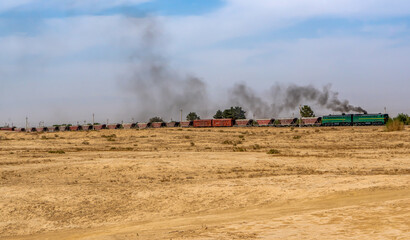 Fototapeta premium Uzbekistan, marchandise train near the city of Termiz (Termez) 