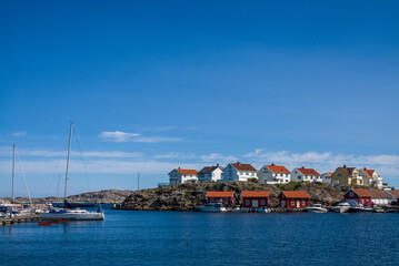 Fototapeta na wymiar Sweden, Bohuslan, Tjorn Island, Ronnang, village and harbor