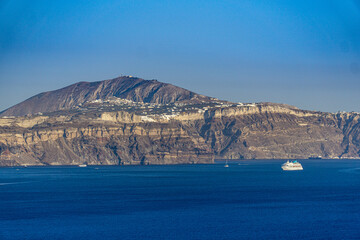 Beautiful view of a boat on the sea in Santorini, Oia, Greece