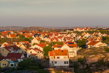 Sweden, Bohuslan, Smogen, view of the town and harbor, high angle view, sunset