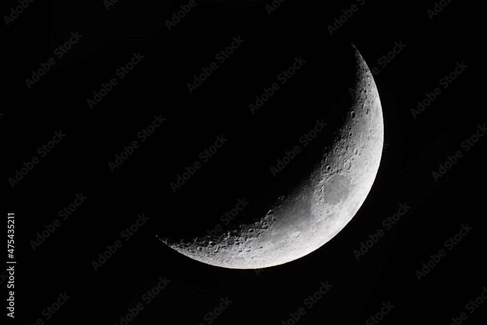 Wall mural the waxing crescent moon starts as the moon becomes visible again after the new moon conjunction whe