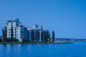 Sweden, Vastmanland, Vasteras, new residential buildings of the Munkangen harbor, dusk (Editorial Use Only)