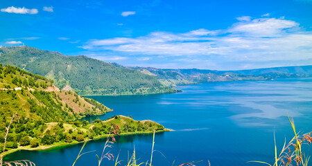 The beauty of Lake Toba which is a caldera lake comes from an ancient volcanic eruption and is the...