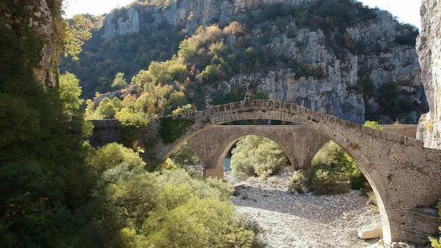 The beautiful old stone bridge known as Kokkoris or Noutsios bridge, near Ioannina town, Epirus Greece.
