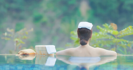 woman relax in hot spring - obrazy, fototapety, plakaty