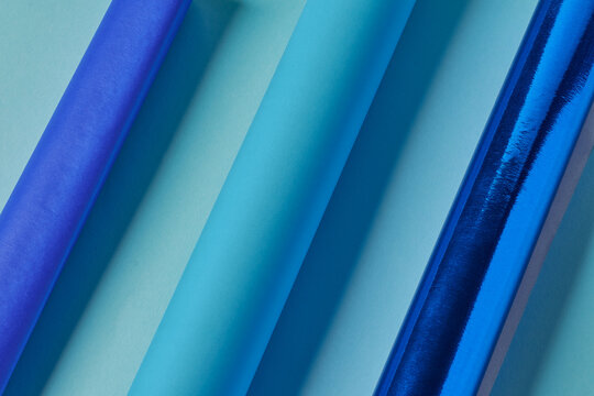 Sky Blue, Turquoise Blue, Royal Blue And Sky Blue Paper Tubes.