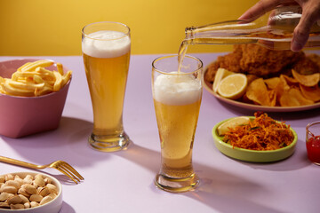 Front view drinking beer with fried potatoes spicy chicken floss and fried chicken , mug of beer and food for advertising