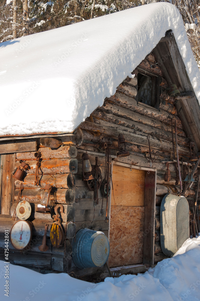 Sticker Log cabin covered with snow, Haines, Alaska, USA