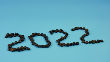 idea and creative number 2022, coffee beans on a blue background
