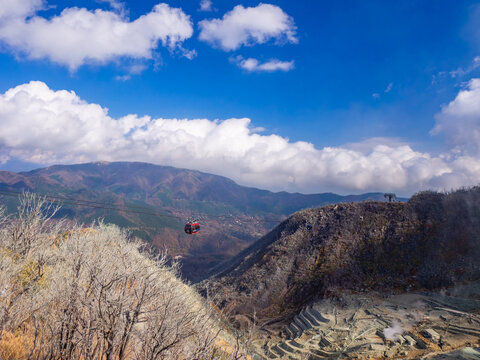 Gondra lifts running over a volcanic valley (Owakudani, Hakone, Kanagawa, Japan)