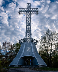 Vertical shot of a cross monument in the Mount Royal Park, Montreal Canada