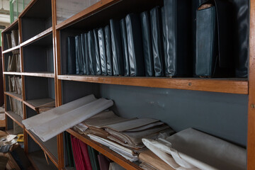 shelving with old folders and documents