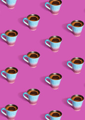Pattern made of coffee cups. Minimal creative concept. Break time on velvet violet backgrounds.