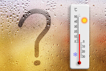 Rainy day. Question mark symbol written on glass. Thermometer for measuring air temperature shows...