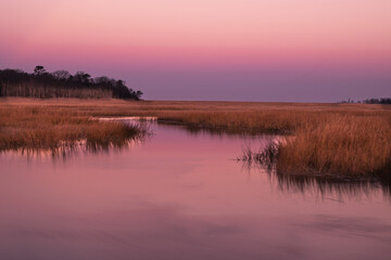 USA, New Jersey, Cape May National Seashore. Sunrise on marsh pond.