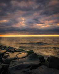 USA, New Jersey, Cape May National Seashore. Sunset on ocean shore.