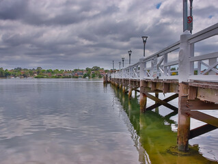 Pier stretching out into Concord Bay on Sydney Harbour NSW Australia
