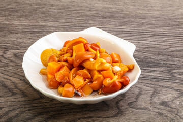 Marinated pickled honey mushrooms in the bowl