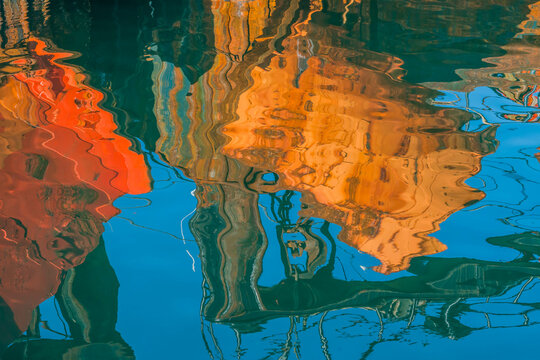 Abstract image trawlers reflecting in water.