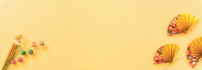 Japanese New Year background. Japanese golden fan and copy space. 日本のお正月の背景素材。金色の扇とコピースペース