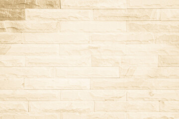 Obraz premium Empty background of wide cream brick wall texture. Beige old brown brick wall concrete or stone textured, wallpaper limestone abstract