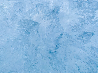 Abstract blue background. Ice patterns with divergent patterns.