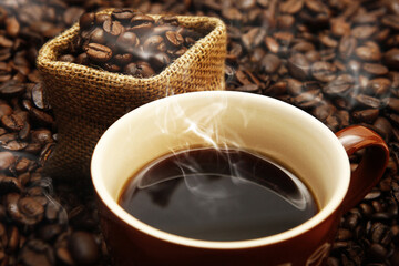 Sweet coffee aroma, coffee beans and hot morning coffee
