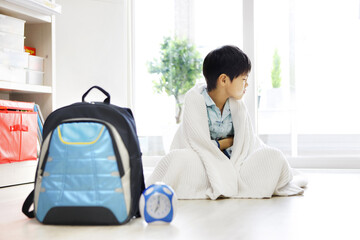 Young student refusing to attend school with new semester syndrome
