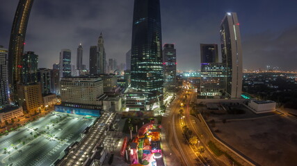 Fototapeta na wymiar Panorama of Dubai International Financial district aerial night to day timelapse. View of business office towers.