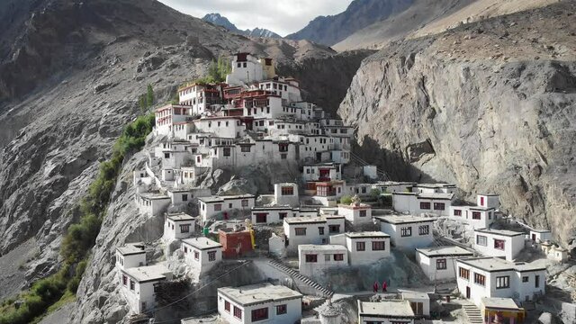 A beautiful aerial drone shot of Diskit Monastery, Nubra Valley, Ladakh. The Buddhist monastery is surrounded by a gorge on the eastern side.